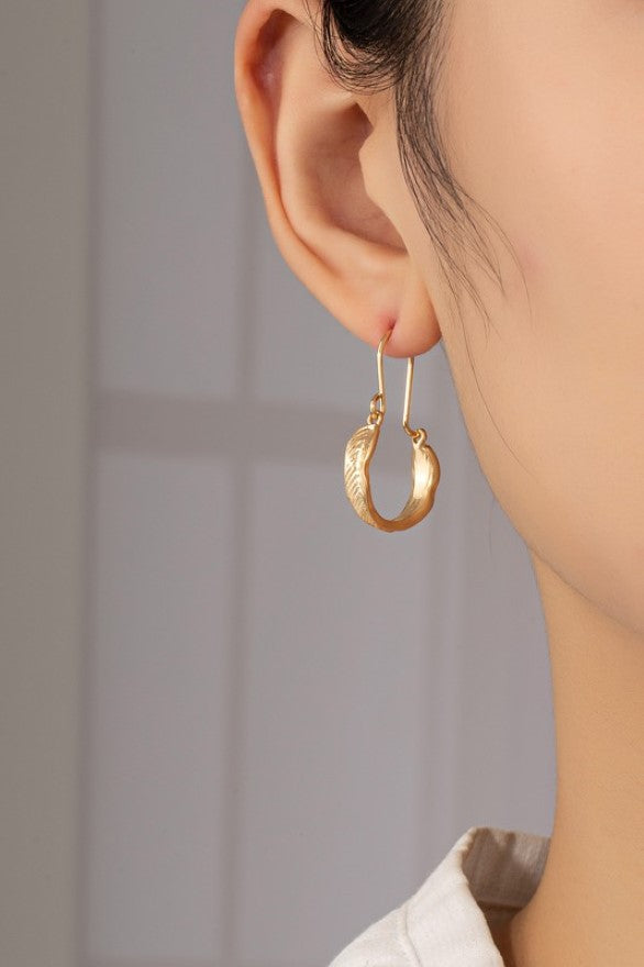 Small feather hoop drop earrings