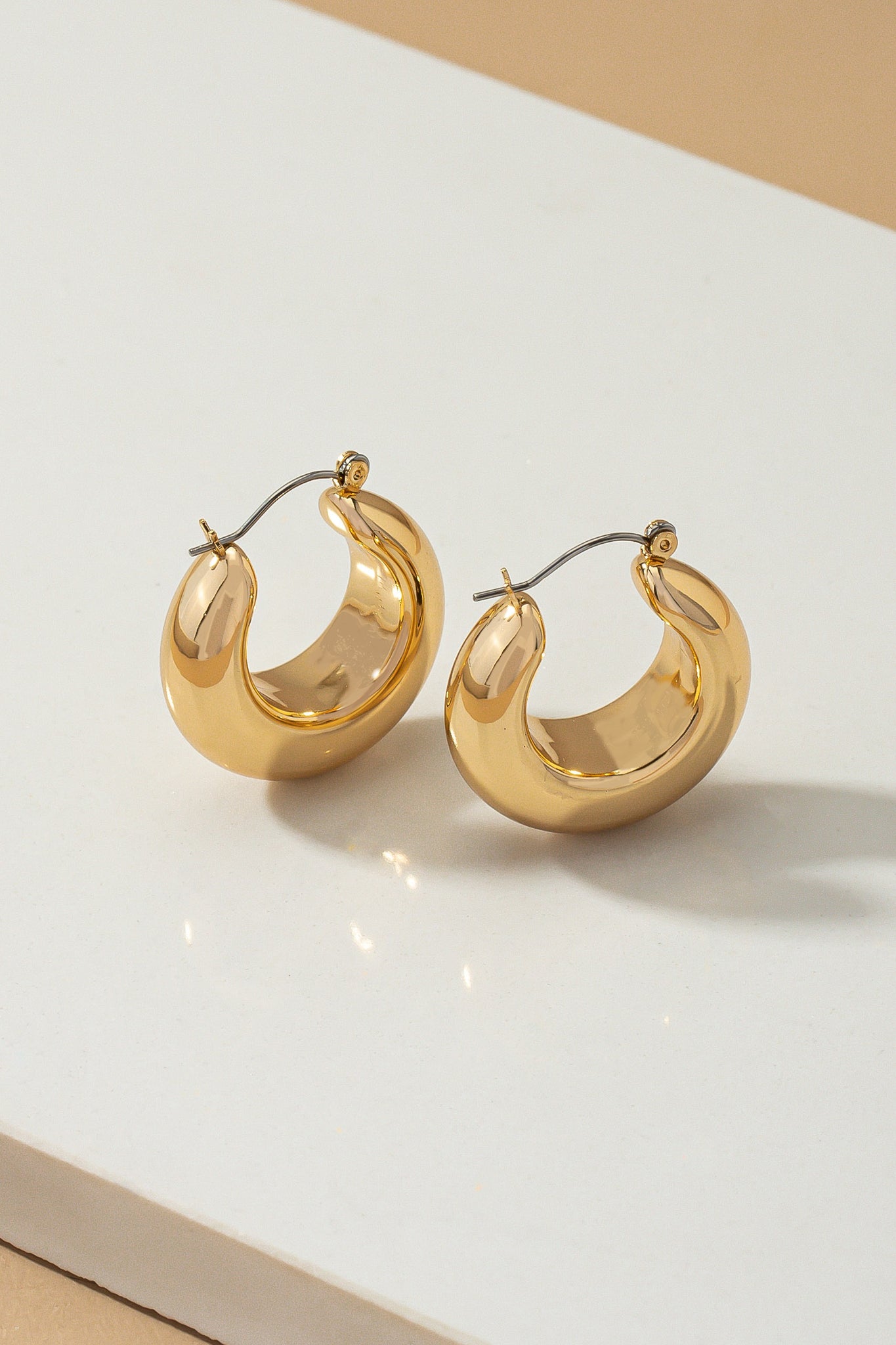 Light Weight Hollow Puffy C Hoop Earrings | Accessories | accessories, beads, coral, drop earrings, earrings, gold, ornate, VC earrings, very carrot | Very Carrot