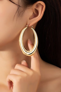 Large puffy hollow oval hoop earrings